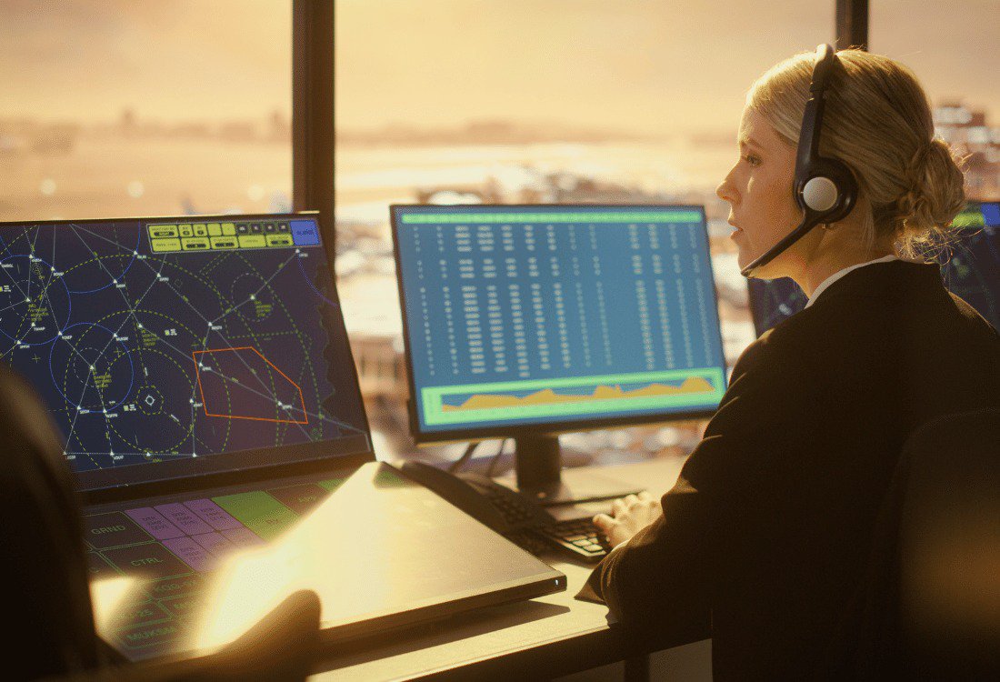 An ATC manager focusing on their role as the ATC alarm monitoring system works in the background.